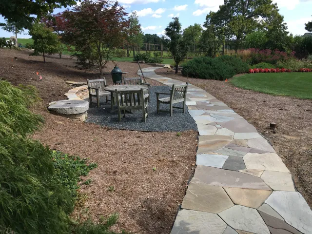 WildWorks curved stone walk and landscape