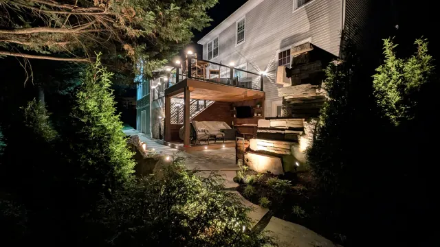 Project Wildfire garden, boulders, rooftop lounge, and fireplace lighting